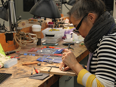 Student making jewelry